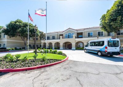 main entrance roundabout driveway with flags